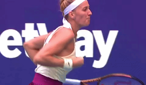 Woman Holding Wilson Tennis Racket GIF