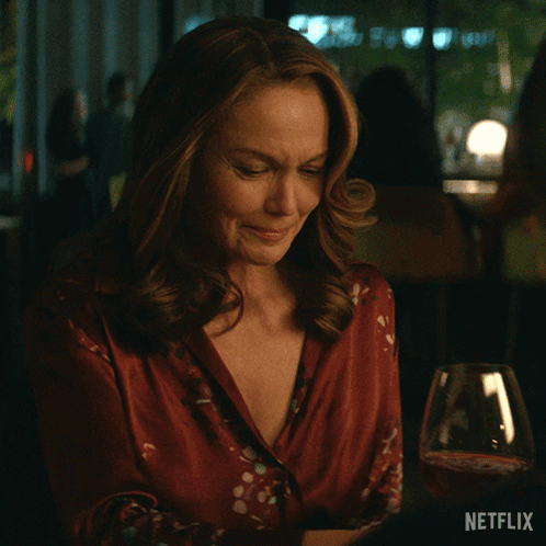 Woman Holding Wine Glass Netflix Logo GIF