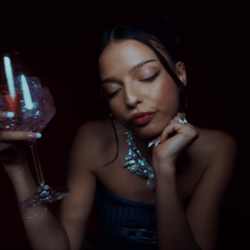 Woman Holding Wine Glass GIF