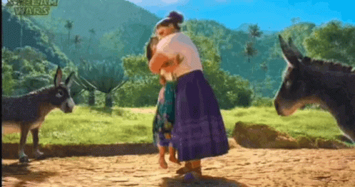 Woman Hugging Child Next To Donkey GIF