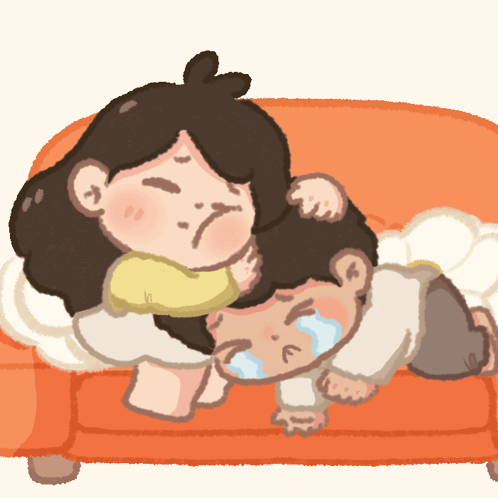Woman Hugging Crying Child on Couch