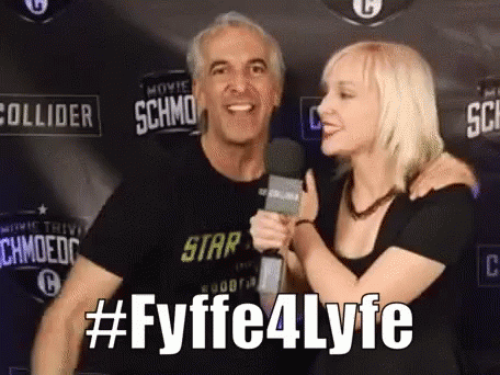 Woman Hugging Man Holding Microphone #fyffe4lyfe