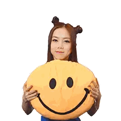Woman Hugging Smile Pillow with Hearts