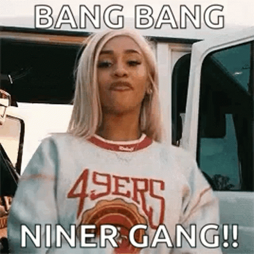 Woman In 49Ers Sweatshirt Standing By Van GIF