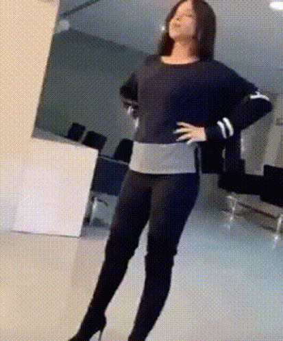Woman In A Heels Standing GIF
