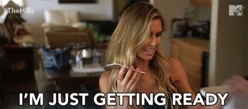 Woman In A Phone Call Just Getting Ready GIF