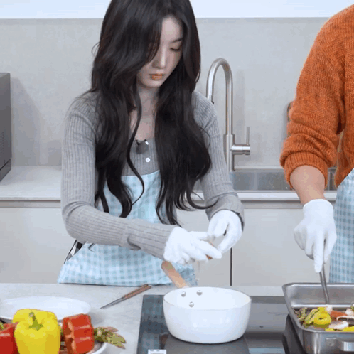 Woman In Apron Preparing Meal GIF