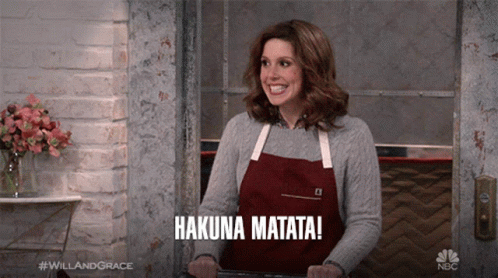 Woman in Apron Says Hakuna Matata