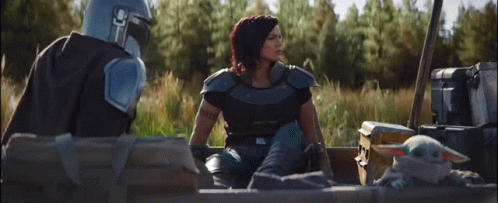 Woman in Armor Sitting in Boat