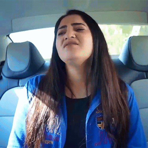Woman in Back Seat Blue Jacket Southern