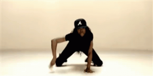 Woman in Baseball Cap Kneeling