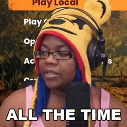Woman in Bear Hat and Headphones at Microphone