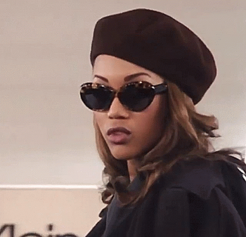 Woman in Beret and Sunglasses