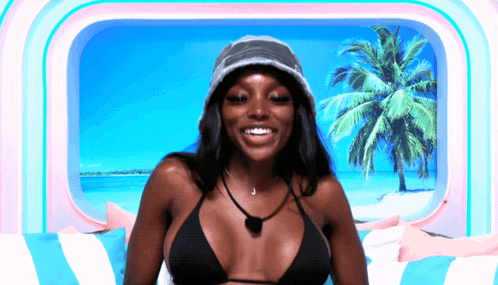 Woman in Bikini and Hat Smiling