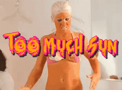 Woman in Bikini in Front of Too Much Sun Sign