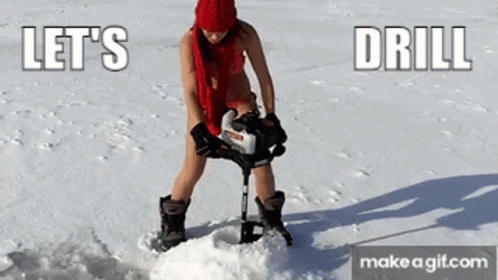 Woman In Bikini Using Drill On Snow GIF