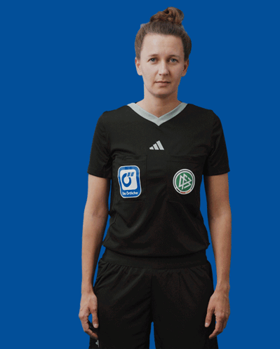 Woman in Black Adidas Shirt With Blue Sticker Saying G