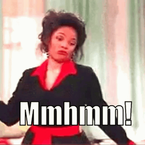 Woman in Black and Red Dress Making Funny Face
