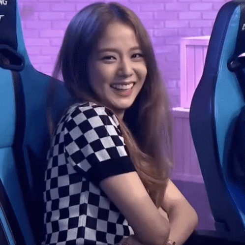 Woman In Black And White Checkered Shirt Smiling GIF