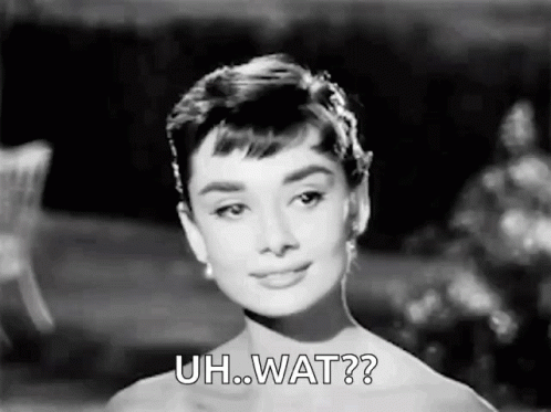 Woman in Black and White Dress Saying Uh Wat