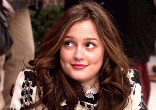 Woman In Black And White Sweater Close Up GIF