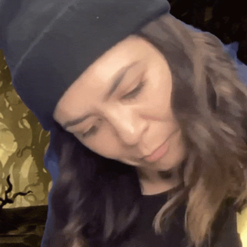 Woman in Black Beanie and Shirt