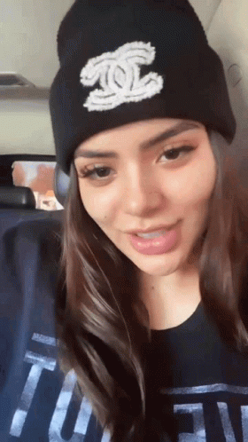 Woman in Black Beanie and Tufn T-Shirt