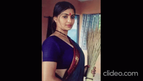 Woman in Black Blouse Holding Breasts