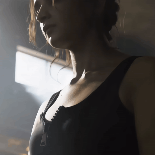 Woman in Black Bra with City Skyline