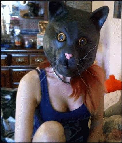 Woman in Black Cat Mask and Blue Tank Top