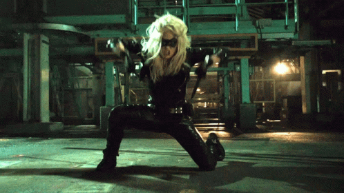 Woman In Black Costume Kneeling GIF