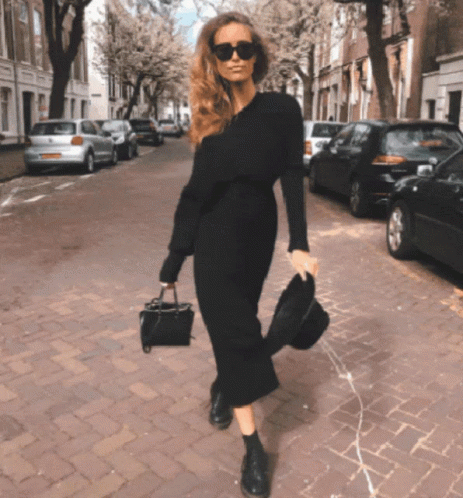 Woman in Black Dress and Sunglasses Walking