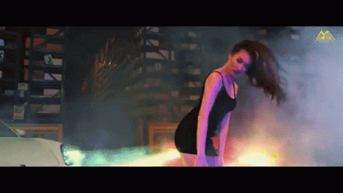 Woman in Black Dress Dancing