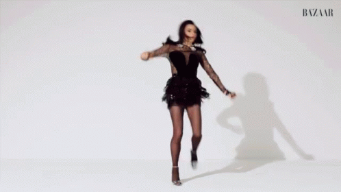 Woman in Black Dress Dancing
