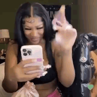 Woman in Black Dress Giving Middle Finger