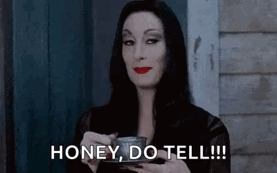 Woman in Black Dress Holding Coffee Say Honey