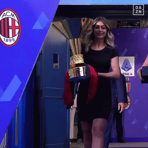 Woman In Black Dress Holding Trophy GIF