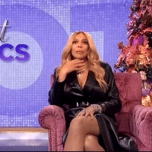 Woman In Black Dress On Pink Chair CS Sign GIF