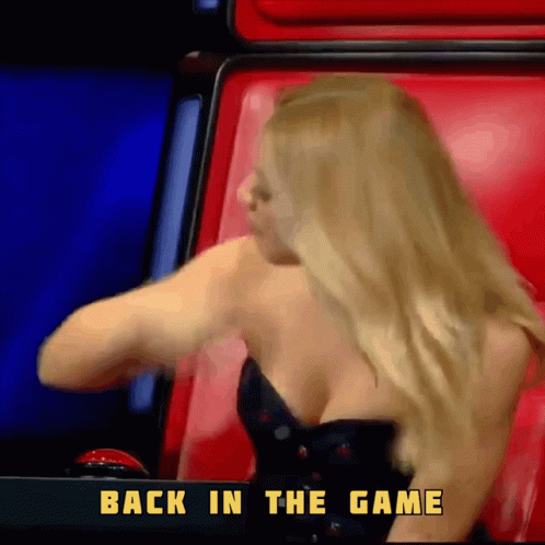 Woman in Black Dress Red Chair Back in the Game