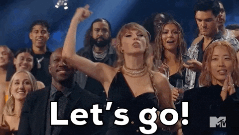 Woman In Black Dress Saying Lets Go GIF