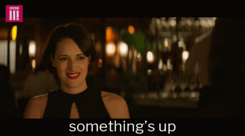 Woman in Black Dress Saying Something's Up
