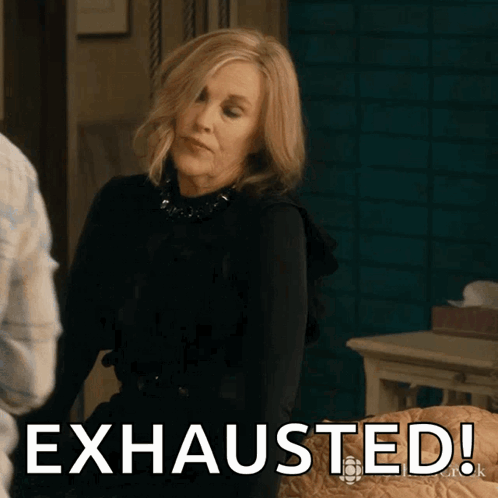 Woman in Black Dress Says Exhausted