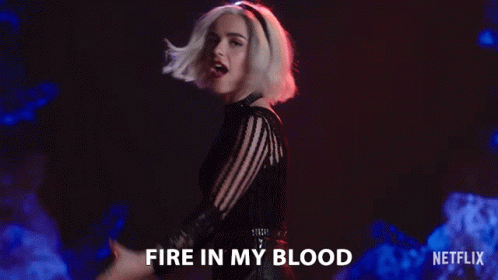 Woman in Black Dress Singing Fire in My Blood
