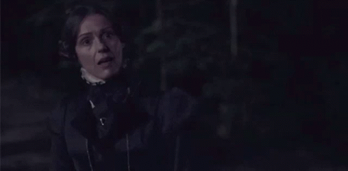 Woman In Black Dress Standing GIF