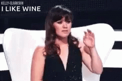 Woman in Black Dress Waving