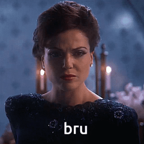 Woman in Black Dress With Bru on Face