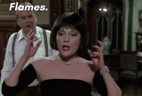 Woman In Black Dress With Flames GIF