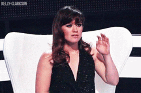 Woman in Black Dress with Kelly Clarkson Text
