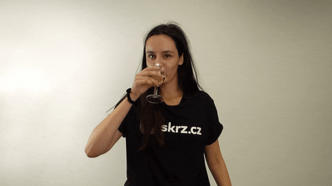 Woman In Black Drinks Prosecco GIF