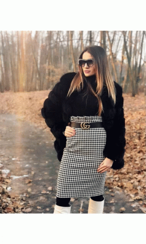 Woman in Black Fur Coat and Gucci Belt